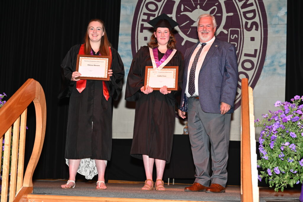 Mayor Brant Burrow with Odessa Stevens (left) and Caitlin Fenn (centre). 